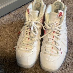 White and red Nike Posite One